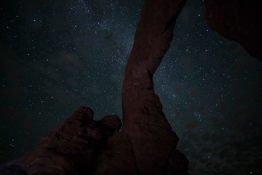 Milky Way Behind Rock Formation Photo Free Night Image On Unsplash