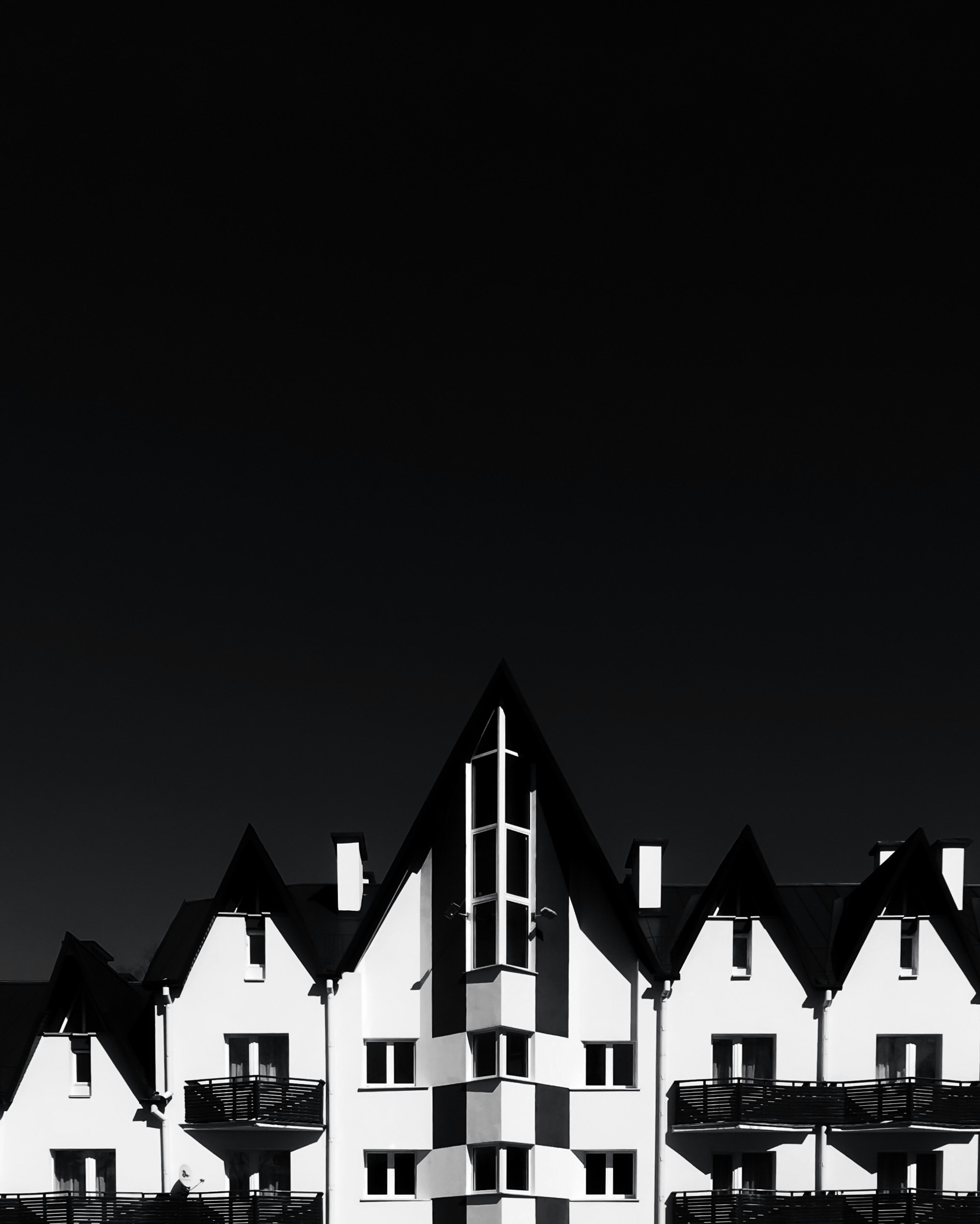 several white and black houses photo – Free Architecture Image on Unsplash