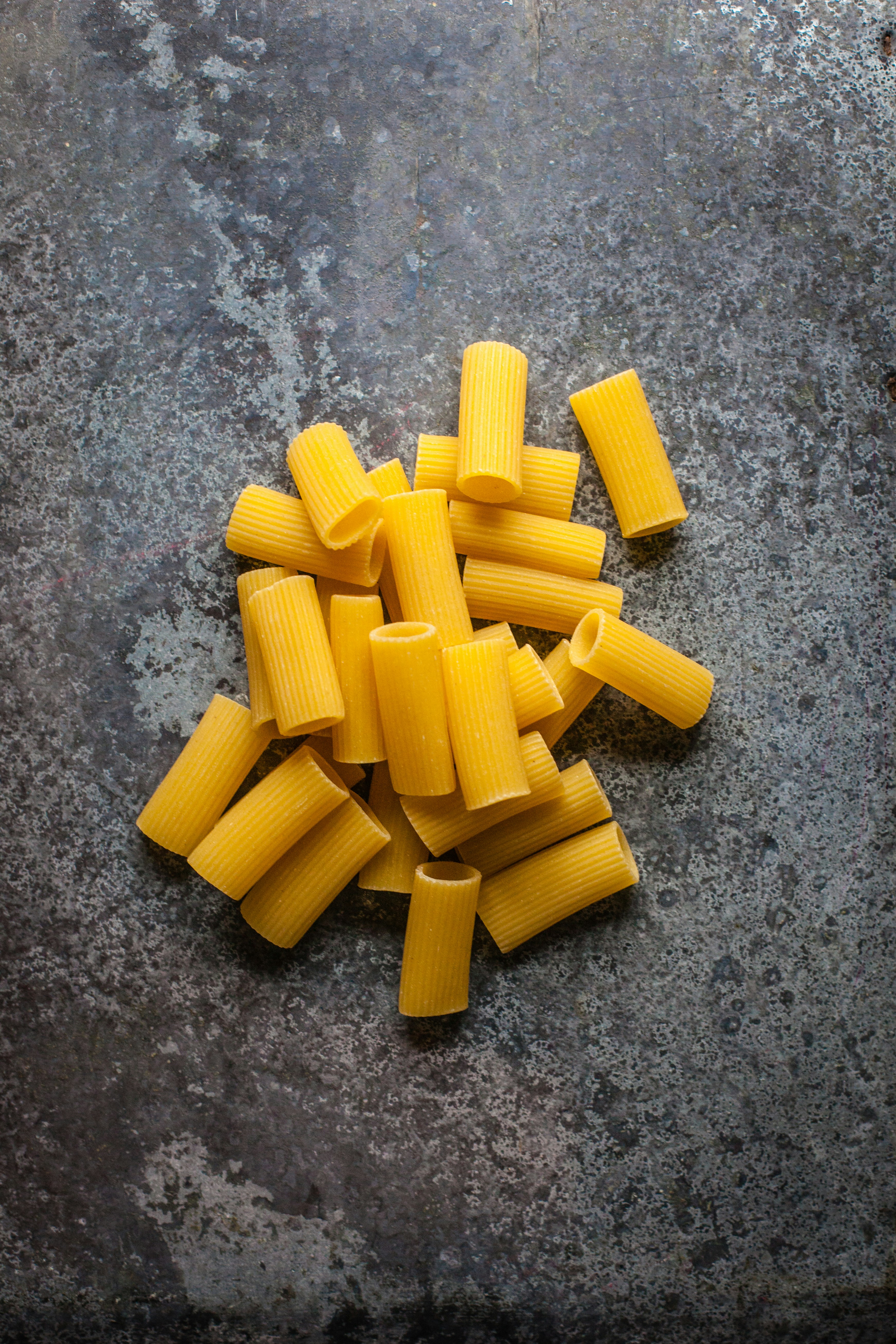 Download Yellow Pasta On Gray Surface Photo Free Toy Image On Unsplash PSD Mockup Templates