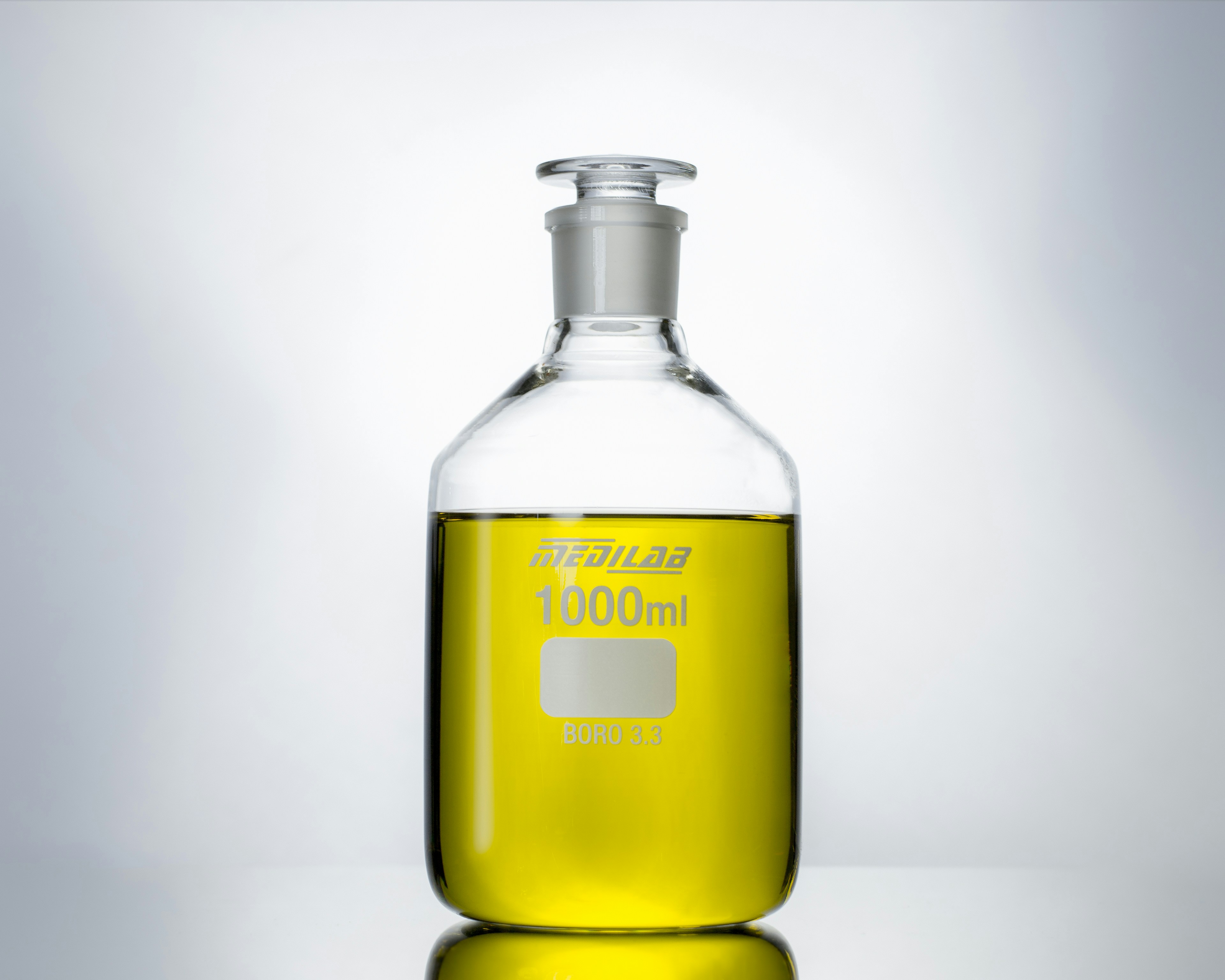 Download Yellow Glass Bottle With White Background Photo Free Alcohol Image On Unsplash PSD Mockup Templates