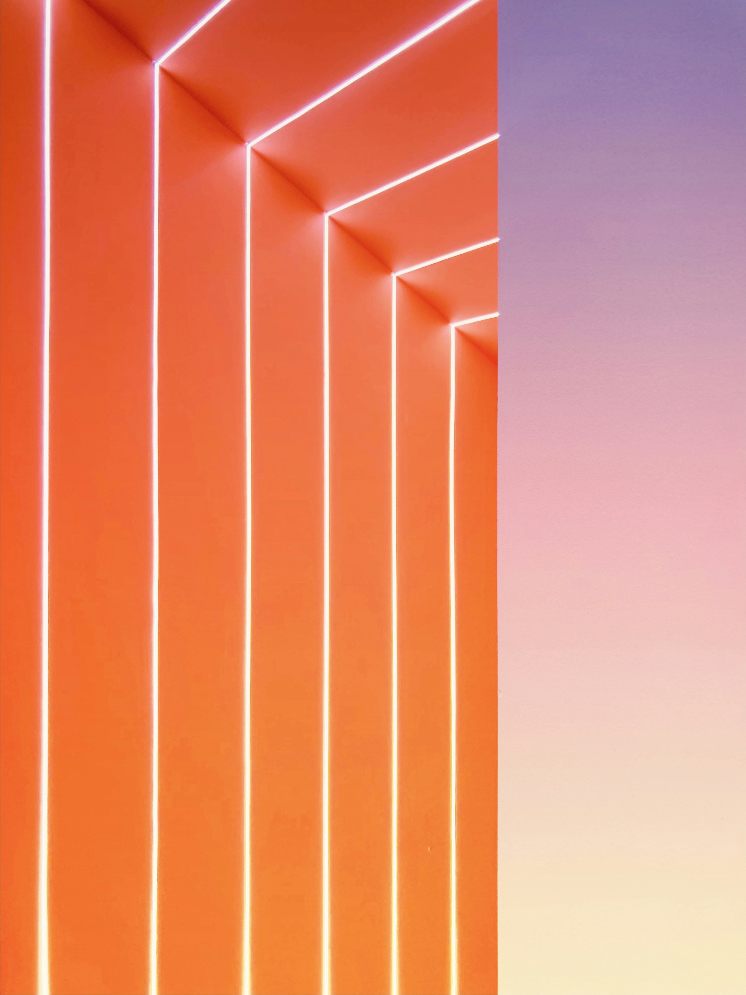 orange and blue striped wall photo Free Backgrounds Image on Unsplash
