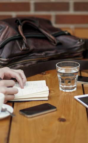 two person sitting in front of table