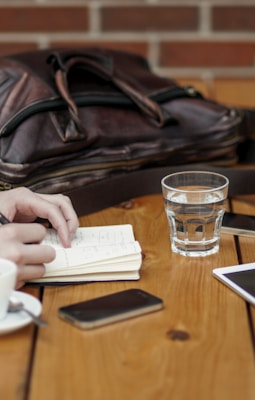 two person sitting in front of table
