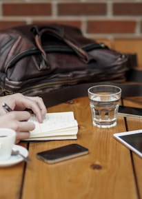 two person sitting in front of table