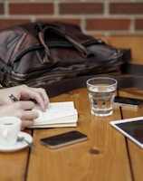 two person sitting in front of table