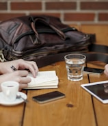 two person sitting in front of table