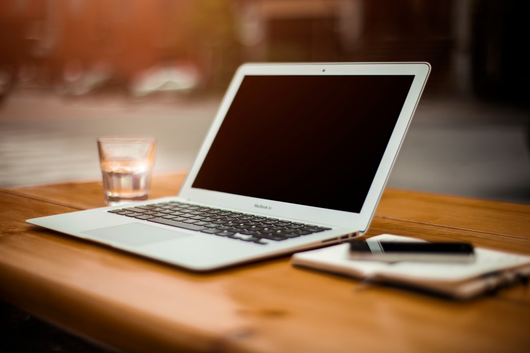 Photo by Alejandro Escamilla photo of turn-off MacBook Air on table