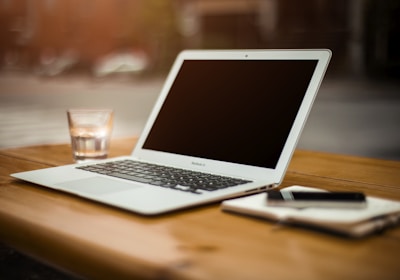 photo of turn-off MacBook Air on table