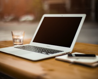 photo of turn-off MacBook Air on table