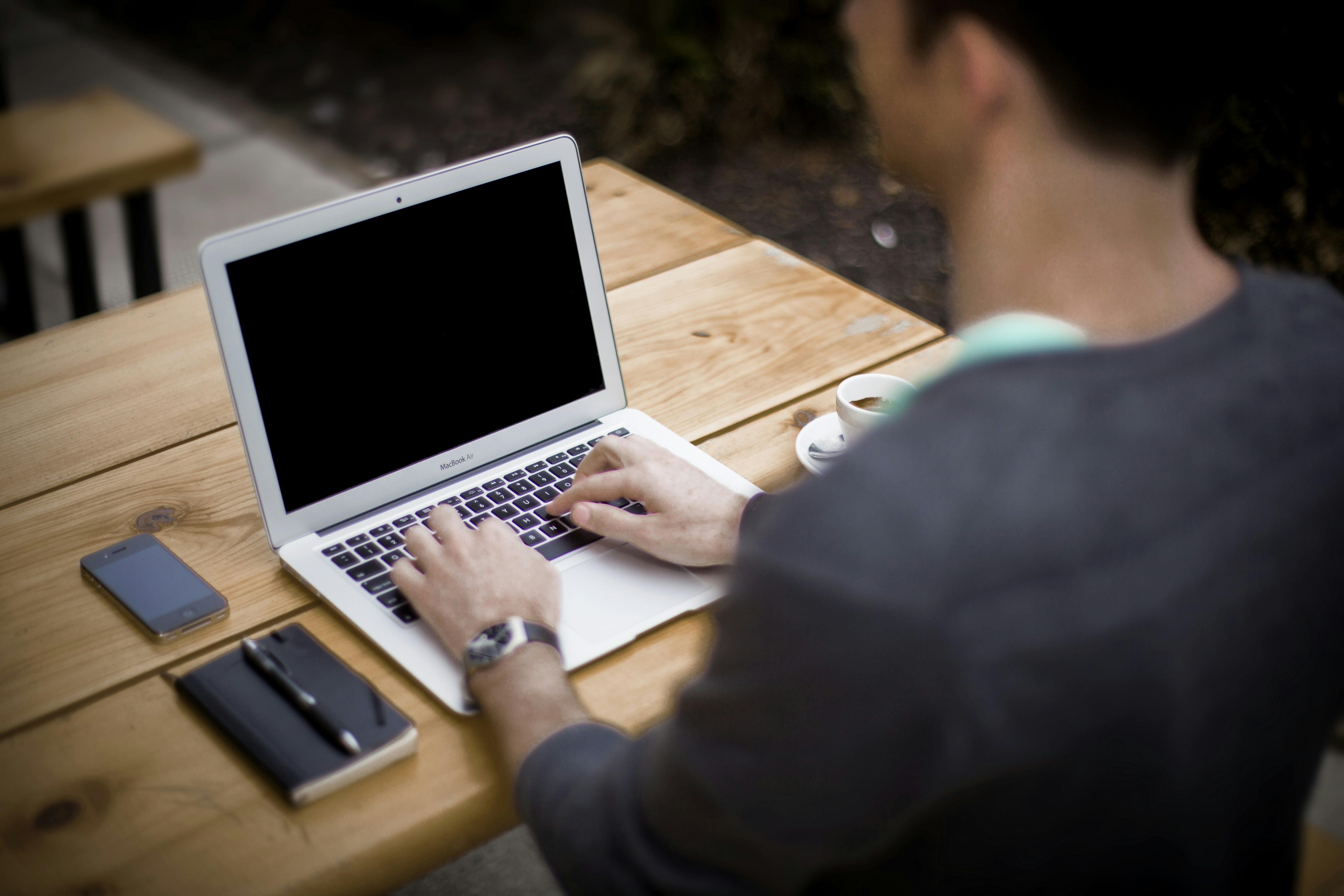 &quot;Working on a laptop outdoors&quot;