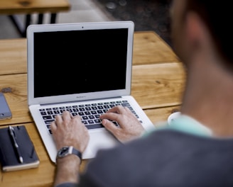 man using MacBook Air