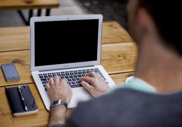 man using MacBook Air