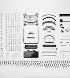 aligned black and gray metal equipment part high-angle photo