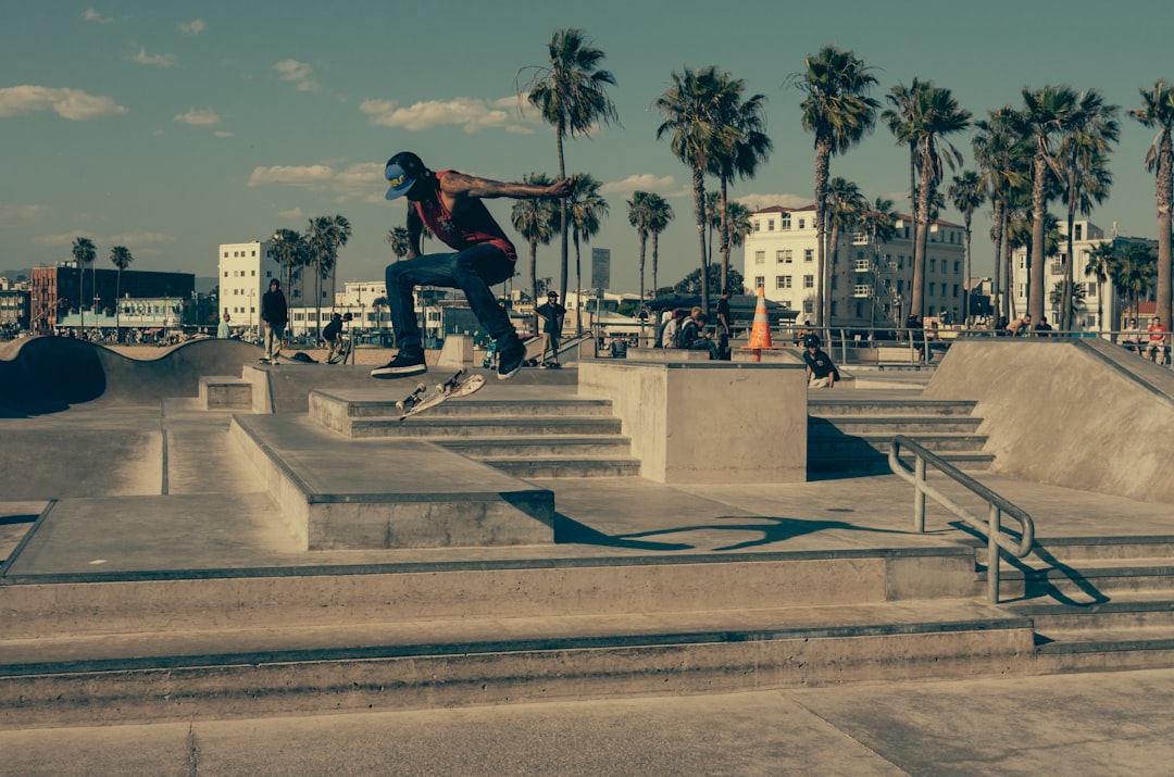 time lapse photography of man skateboarding outside