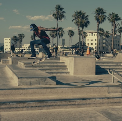 time lapse photography of man skateboarding outside