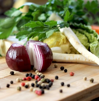 red onion on brown wooden chopping board