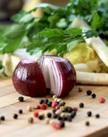 red onion on brown wooden chopping board