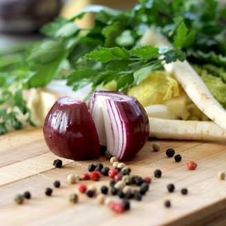red onion on brown wooden chopping board