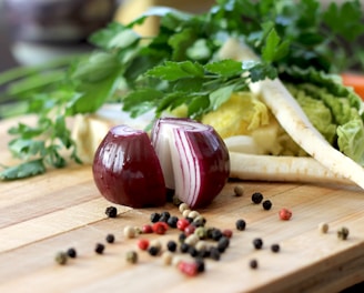 red onion on brown wooden chopping board