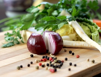 red onion on brown wooden chopping board