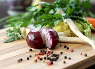 red onion on brown wooden chopping board