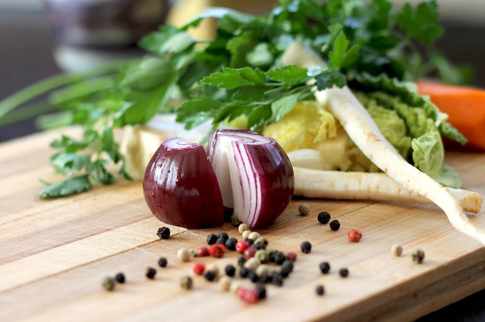 red onion on brown wooden chopping board