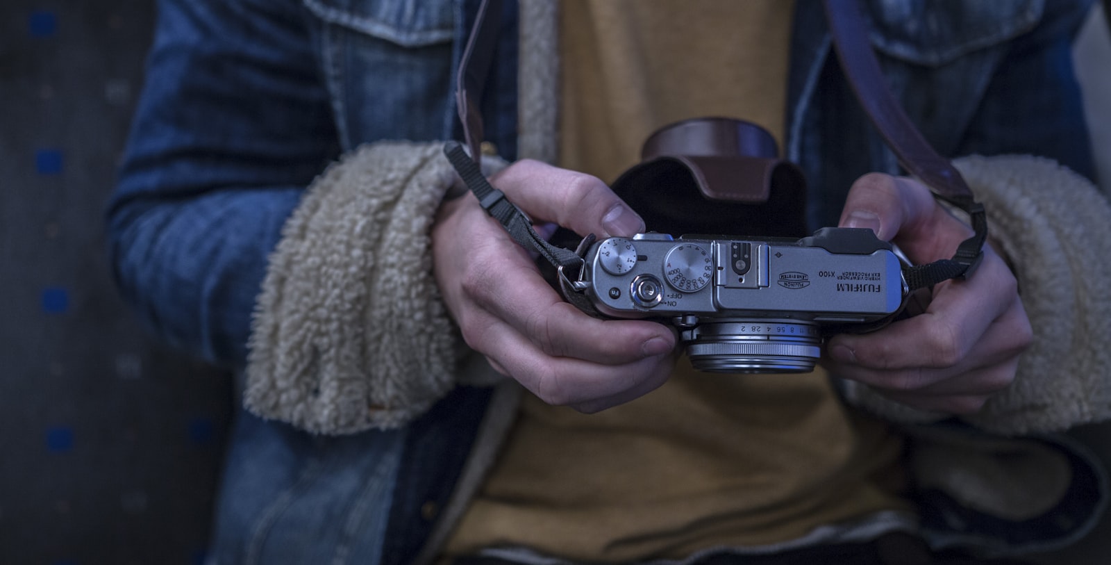 Sigma 18-35mm f/1.8 DC HSM sample photo. Person holding camera photography