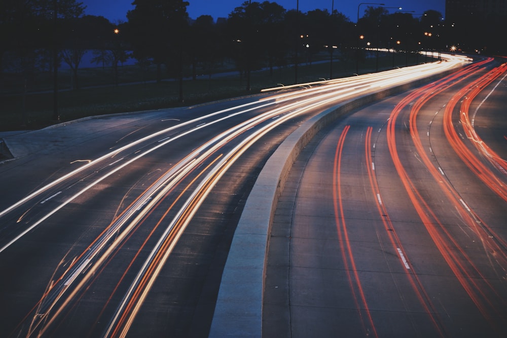 time-lapse of vehicles on road during night