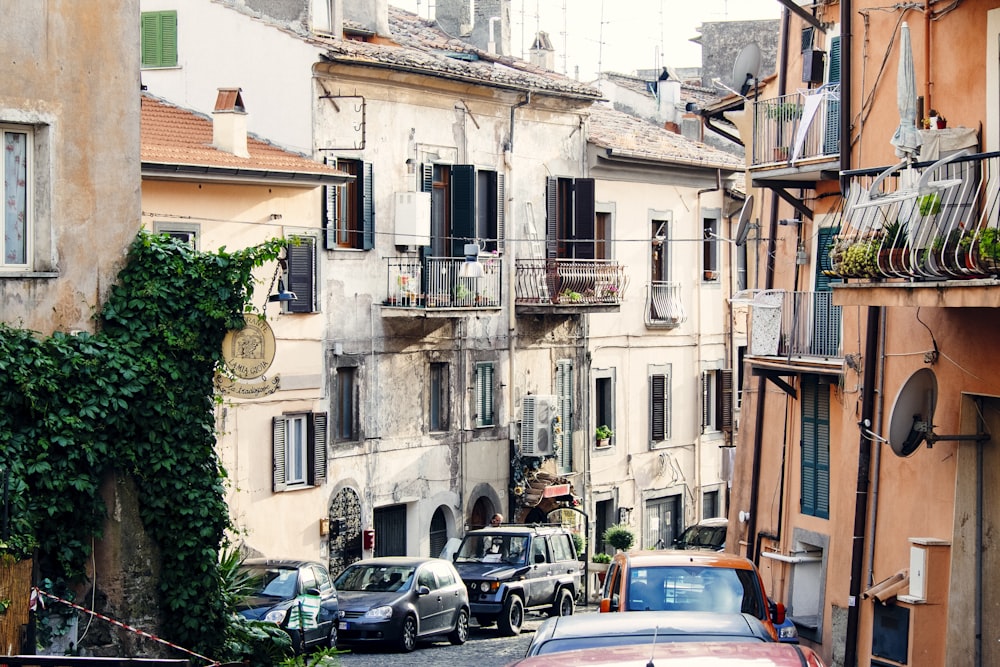 parked cars beside houses