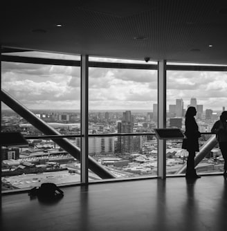 people standing inside city building