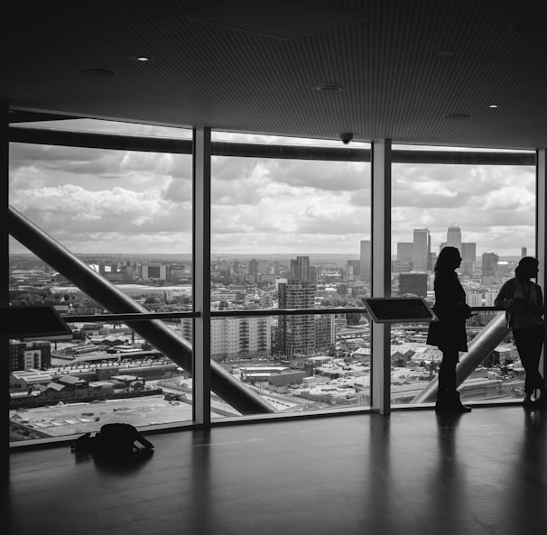 people standing inside city building