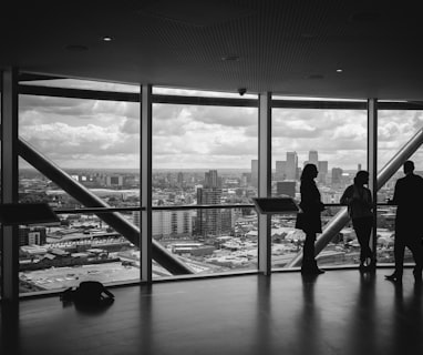 people standing inside city building