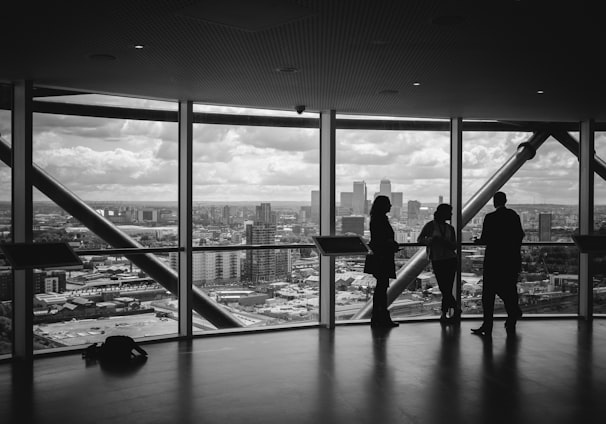 people standing inside city building