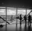 people standing inside city building