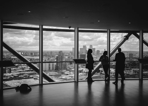 people standing inside city building