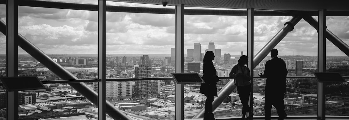 people standing inside city building