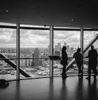 people standing inside city building