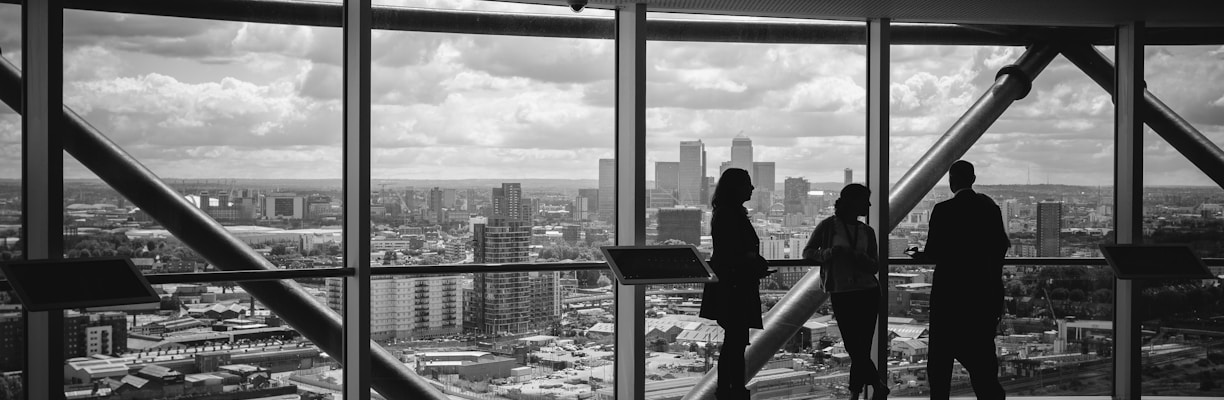 people standing inside city building