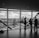 people standing inside city building