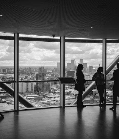 people standing inside city building