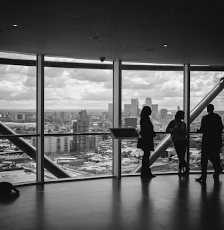 people standing inside city building