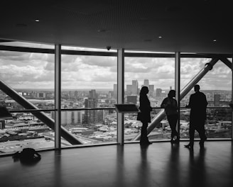 people standing inside city building