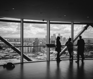 people standing inside city building