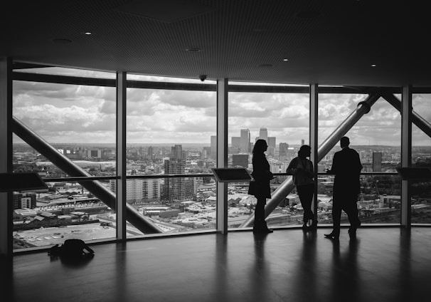 people standing inside city building