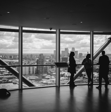 people standing inside city building