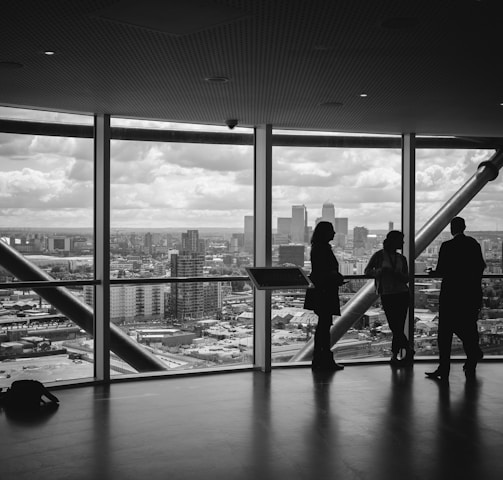 people standing inside city building