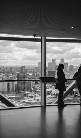 people standing inside city building
