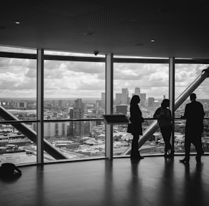 people standing inside city building