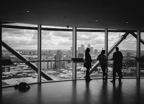 people standing inside city building