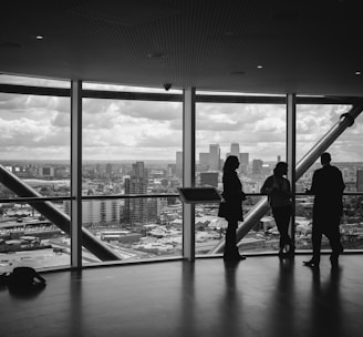 people standing inside city building